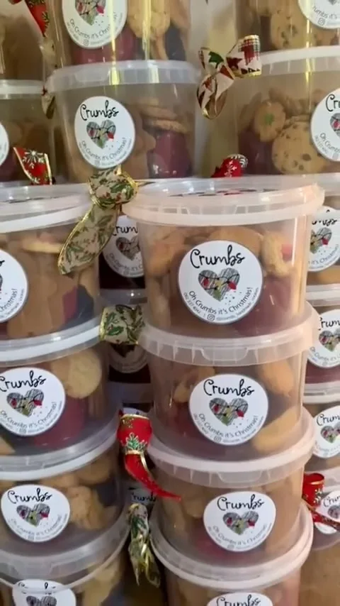Crumbs-labelled tubs of mixed cookies