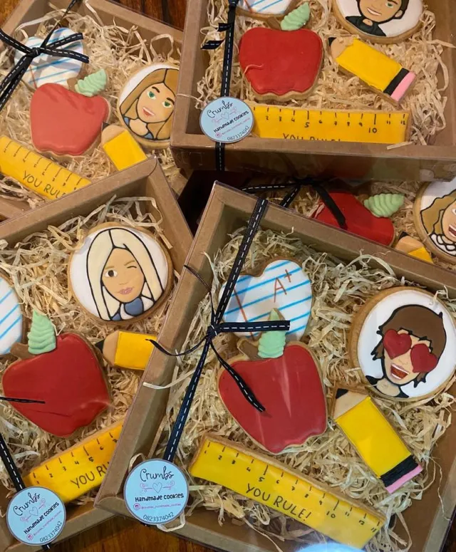 Teacher gift boxes with apple, pencil and ruler cookies